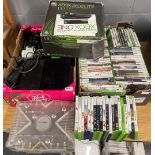 A quantity of Xbox consoles, accessories and games.