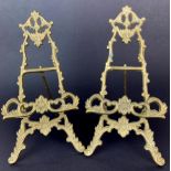 A pair of brass artists easels, H. 21cm.