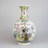 A large Chinese porcelain vase decorated with peacocks, H. 39cm.