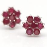 A pair of 925 silver cluster earrings set with rubies, Dia. 1.3cm.