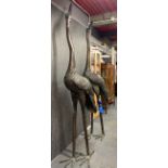 A superb pair of very large bronze cranes, H. 260cm, one with damaged rear claws, pieces present.