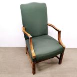 A 20th Century oak and green pinstripe upholstered armchair, H. 108cm.