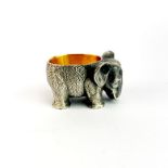 A small, heavy Russian .84 silver and gilt lined elephant salt, H. 3cm, L. 5cm.