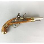 A reproduction flintlock pistol.