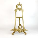 A gilt brass easel, H. 56cm.