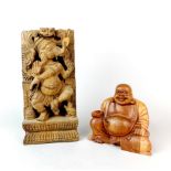 A carved wooden figure of a seated Buddha. H. 16cm, together with a carved wooden Ganesh, A/F.