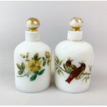 A pair of 19th century French opaline glass perfume bottles, H. 12cm. Both A/F.