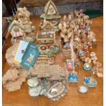 A large group of Pendelfin figures and cottages, largest H. 30cm. Boat dock A/F.