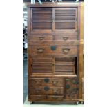 A vintage pine kitchen cabinet in two sections, W. 97cm, H. 177cm, D. 45cm.