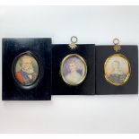 Two Georgian style hand painted miniatures of ladies and a framed printed miniature of a bearded