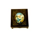A 19th/early 20th century brass dressing table box inset with a hand painted miniature signed Le