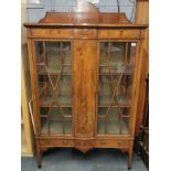 An early 20th Century inlaid mahogany and figured walnut two drawer display cabinet, 185 x 110 x