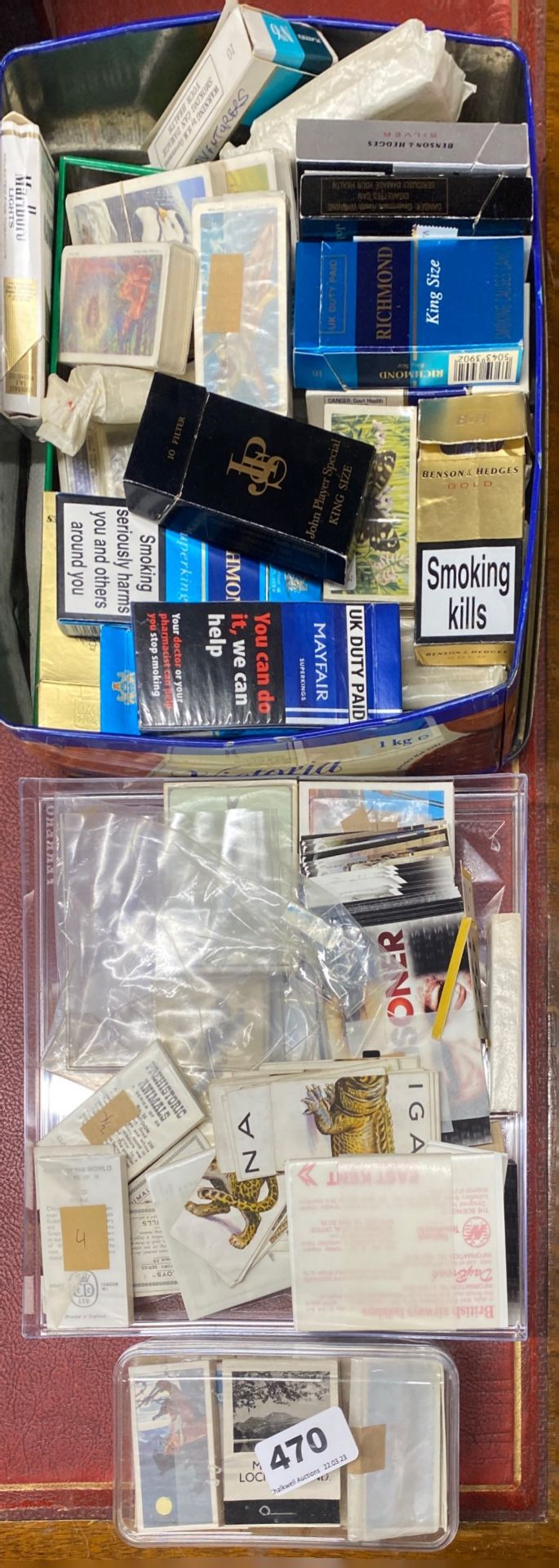 A collection of cigarette and tea cards.