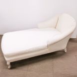 A cream upholstered chaise longue with fitted cushion, L. 150cm, H. 76cm.