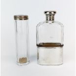 Two hallmarked silver topped dressing table bottles.