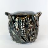 A large Russian silver and gilt lined elephant head cup with garnet eyes, H. 7cm W. 9cm.