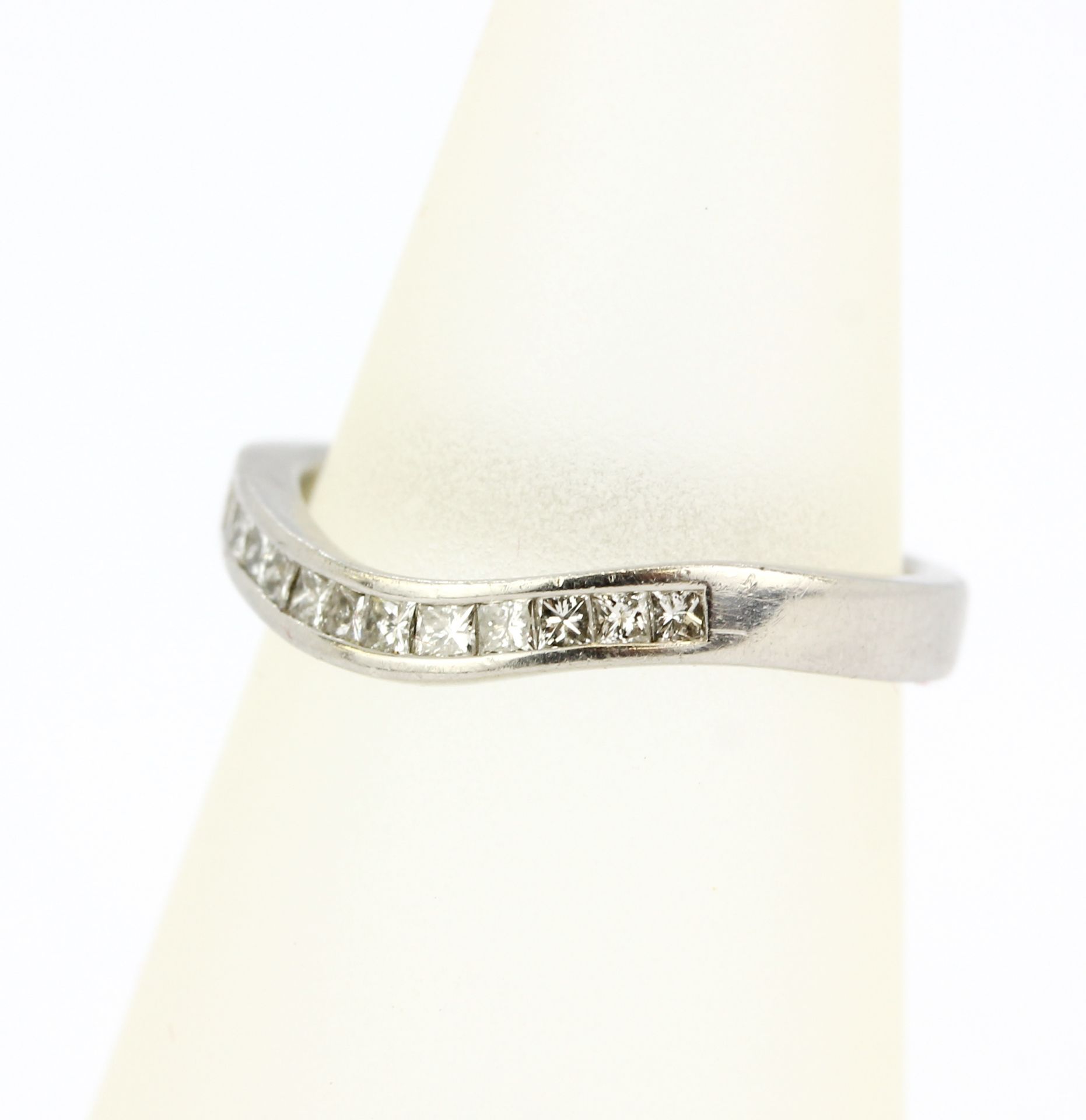 A platinum (stamped) ring set with diamonds, (J). - Image 4 of 4