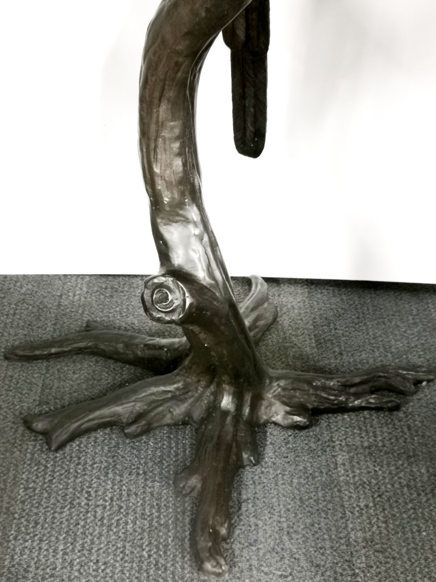 A heavy quality bronze sculpture of a parrot perched on a branch, H. 158cm. - Image 3 of 3