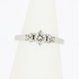 An 18ct white gold (tested) ring set with brilliant cut diamonds, centre approx. 0.40ct, (I.5).
