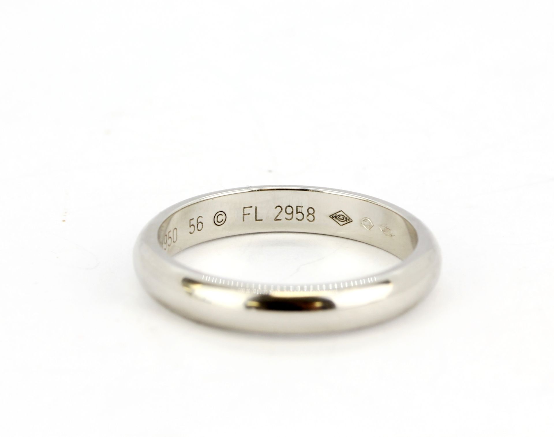 A boxed white gold and platinum Cartier wedding band, (P). - Image 4 of 4