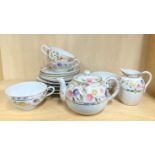 A 1920's Japanese hand painted porcelain four setting tea set.