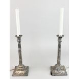 A pair of silver plated column candlestick table lamps, H. 51cm.