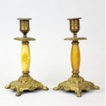 A pair of gilt brass and alabaster candlesticks, H. 19cm.