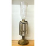 A large gilt metal and cut crystal candle lantern with engraved glass shade, two lustres missing and