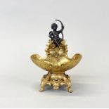 A gilt bronze cherub and shell centre piece, after E. Prevost, H. 17.5cm.