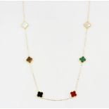 An 18ct yellow gold necklace set with tiger's eye, mother of pearl, malachite, onyx and carnelian,