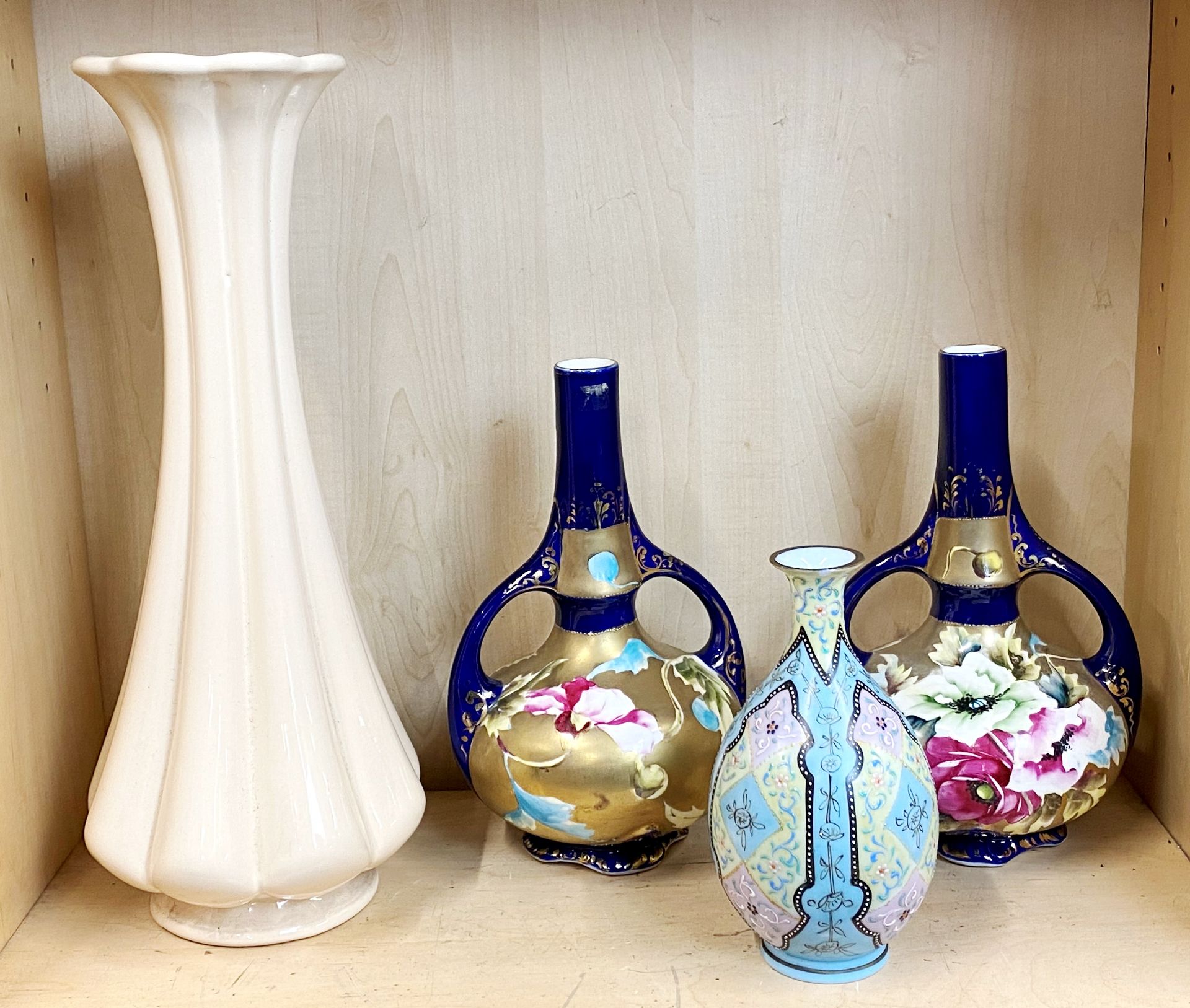 A pair of Royal Doulton hand painted porcelain vases, H. 26cm together with a hand painted opaline