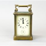 A French brass carriage clock, A/F to glass and missing hand but appears to be in w/o (not