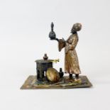 An early 20th Century Vienna cold painted bronze figure of an Arab trader, H. 14.5cm.