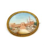 A large yellow metal (tested approx. 22ct gold) hand painted miniature brooch/pendant depicting
