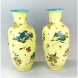 A pair of Chinese crackle glazed porcelain vases decorated with vegetables and insects, H. 44cm.