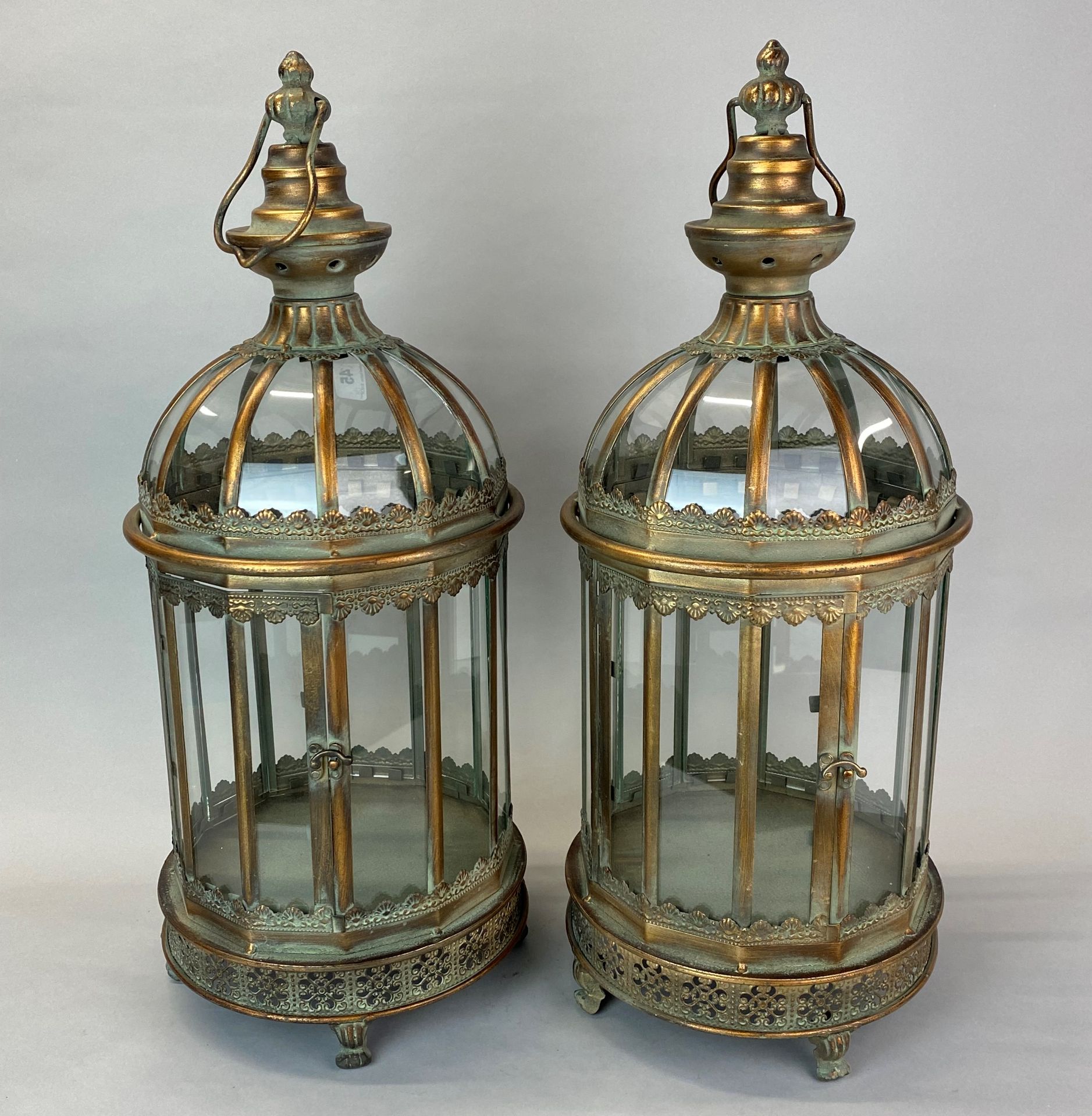 A pair of classical garden storm lanterns, H. 59cm.