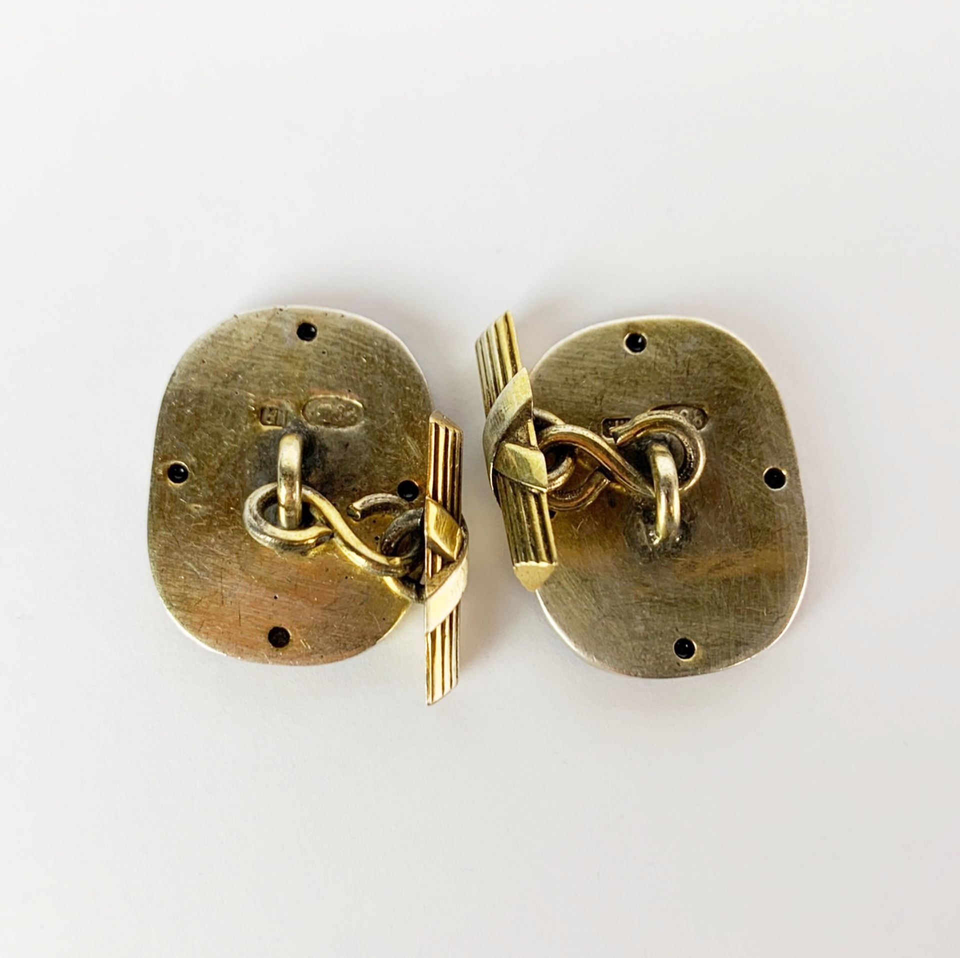 A pair of Russian silver gilt and enamel, garnet set cufflinks, 12 x 21mm. - Image 2 of 2