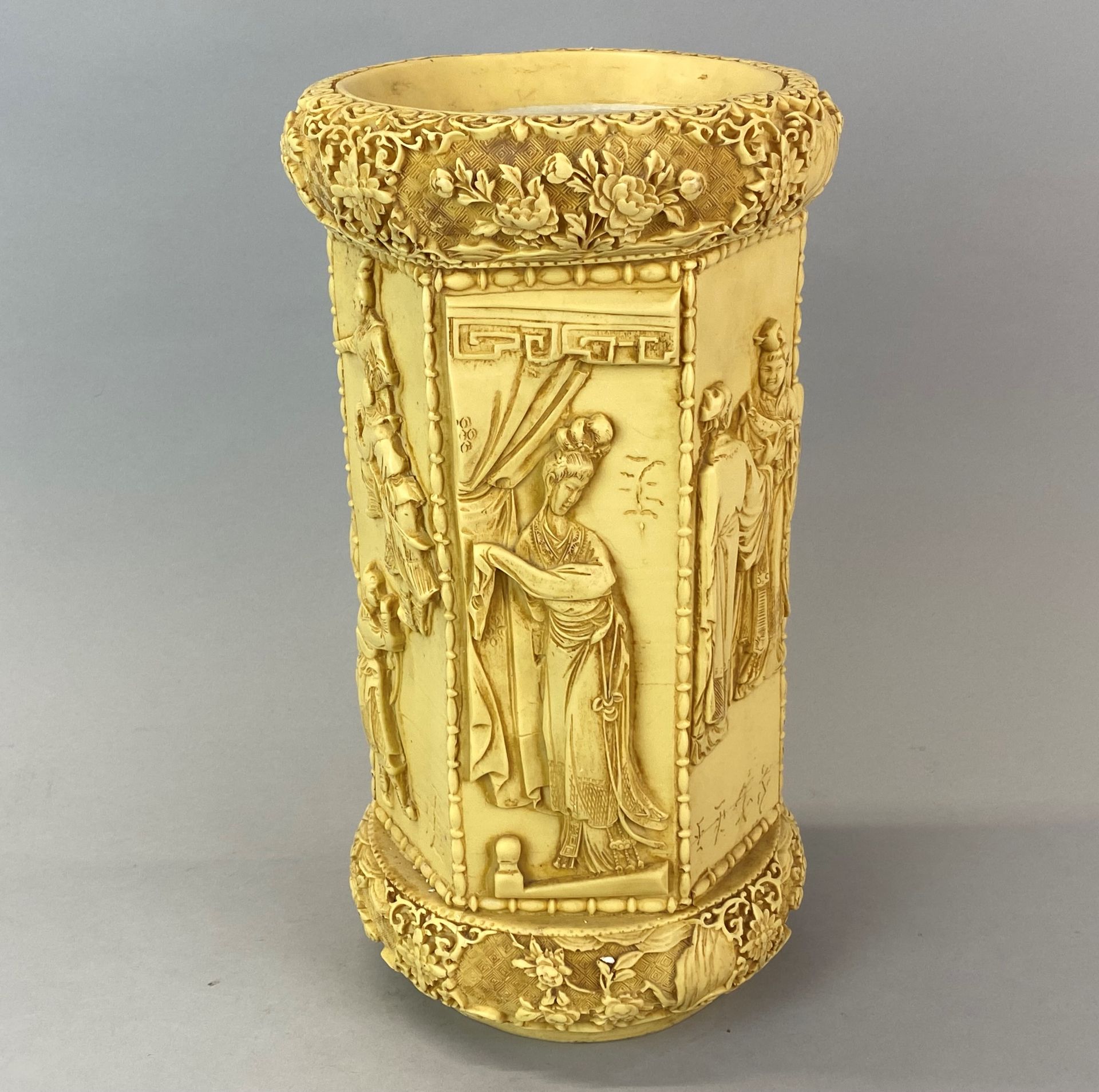 An oriental design heavy resin vase/ stick stand imitating ivory, H. 37cm.