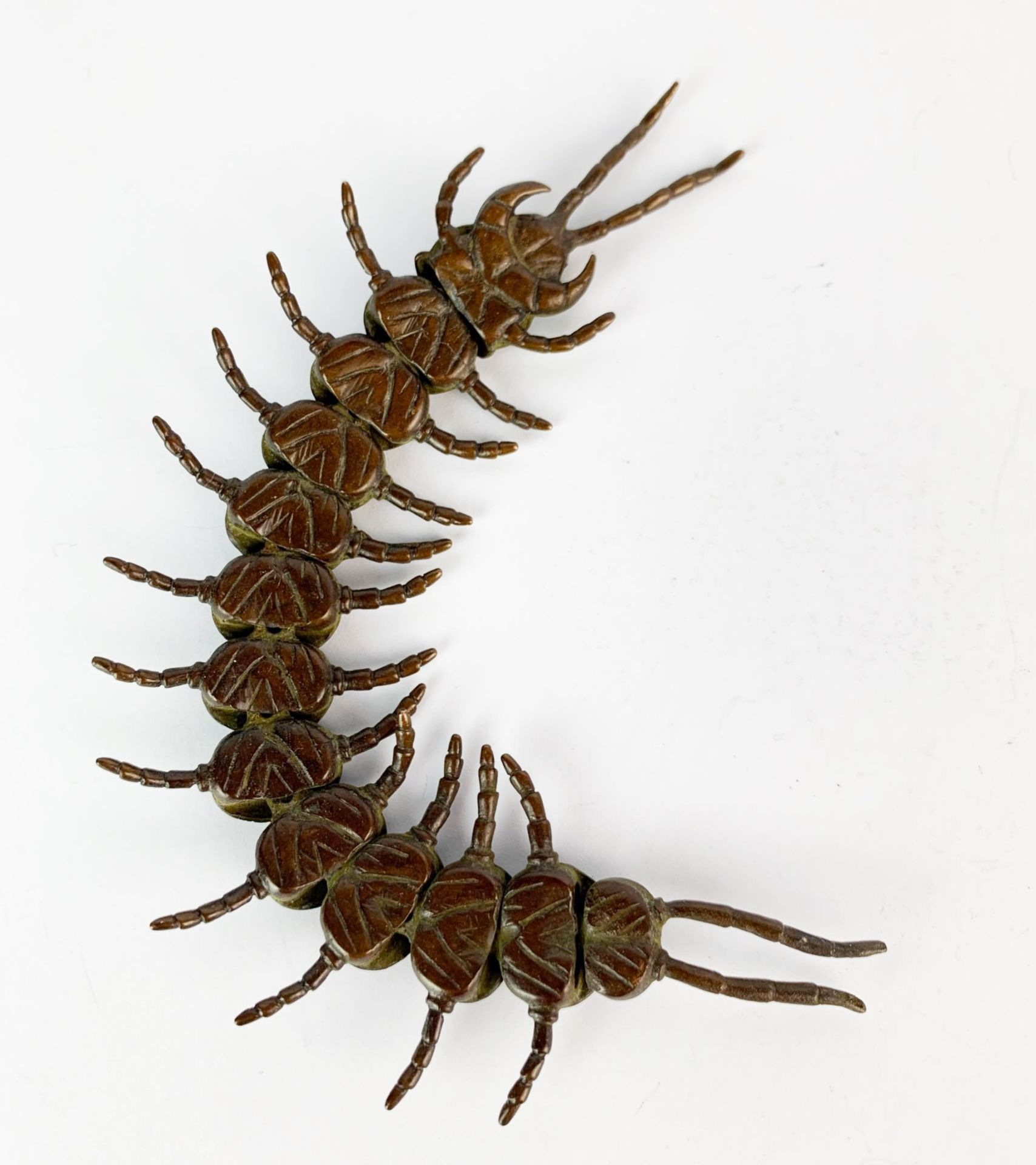A large Japanese articulated bronze centipede, L. 16cm.