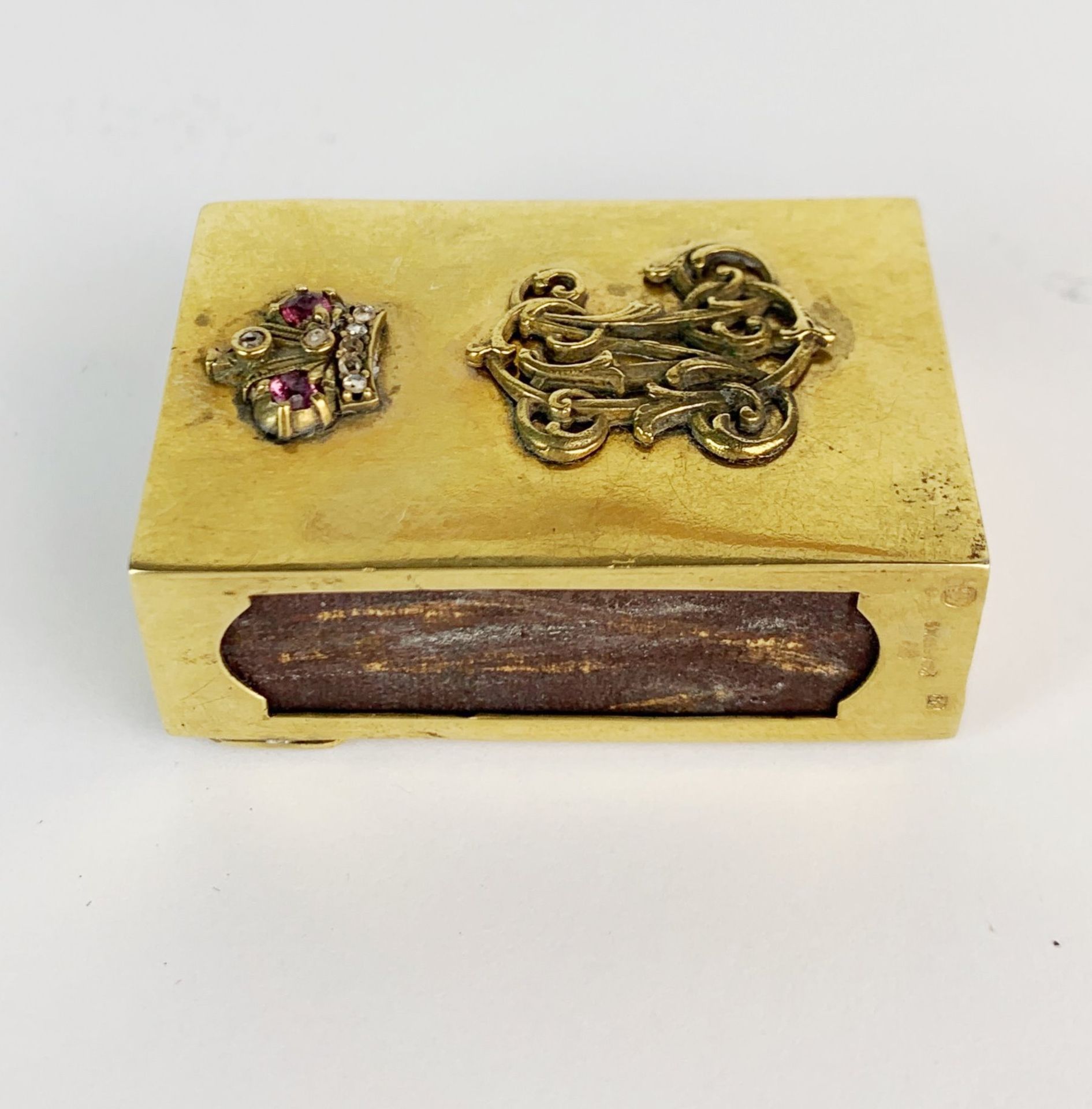 A Russian silver gilt and enamel matchbox cover set with rubies and diamonds, 4.1 x 2.8 x 1.5cm. - Image 4 of 4