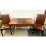 A lovely leather covered iron and brass framed chess and backgammon table, 111 x 73 x 55cm