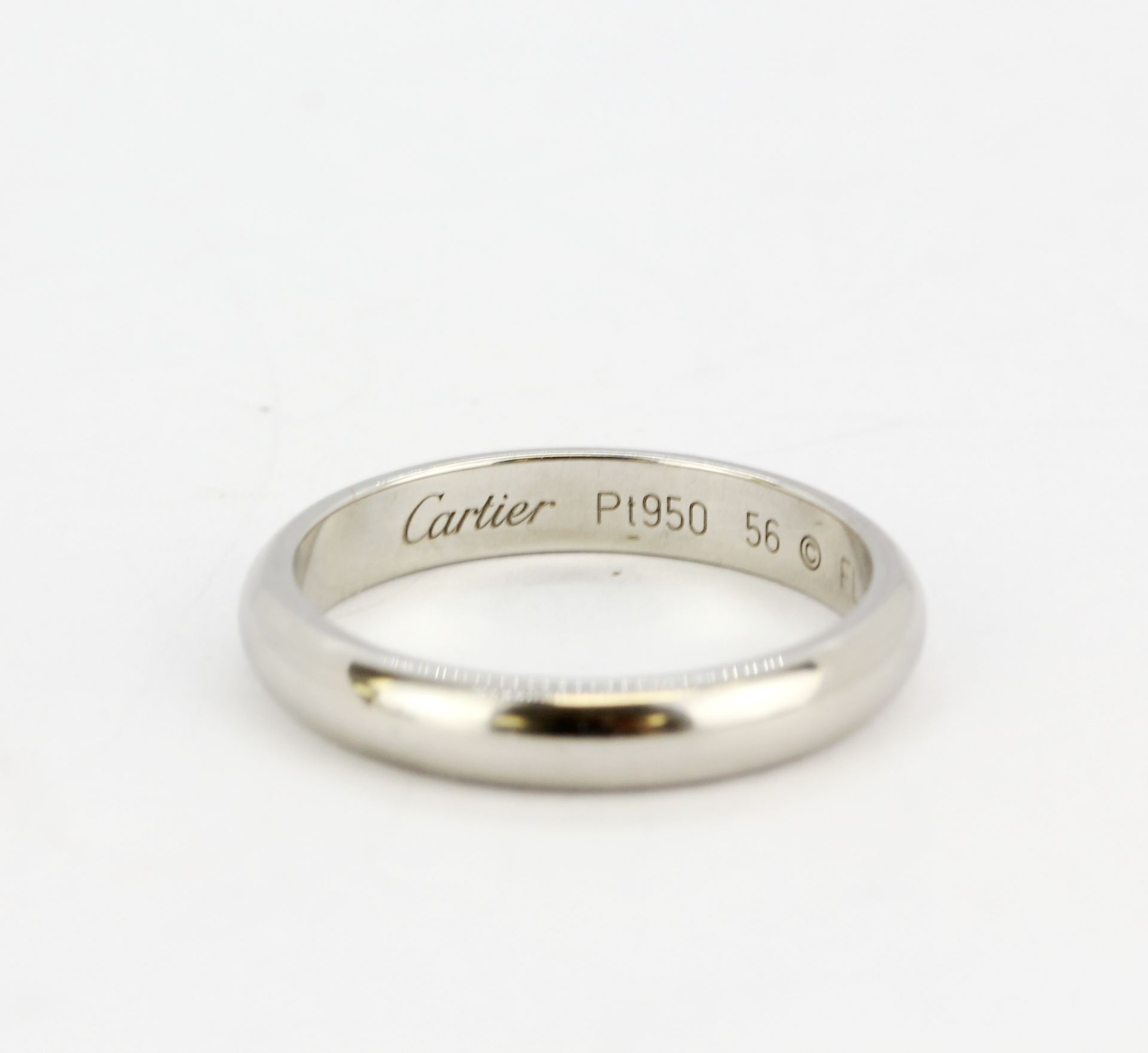 A boxed white gold and platinum Cartier wedding band, (P). - Image 3 of 4