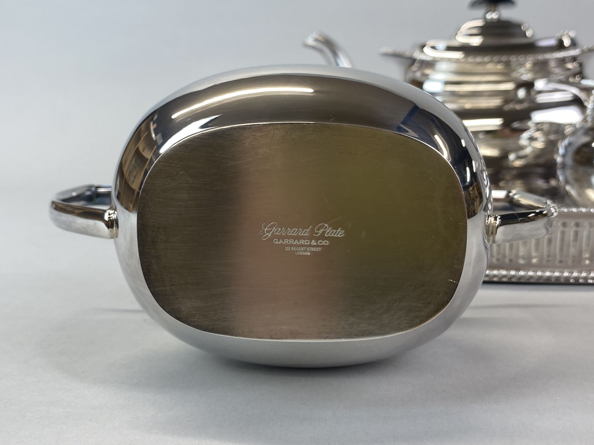 A Garrard and Co silver plated tea set and gallery tray. - Image 4 of 4