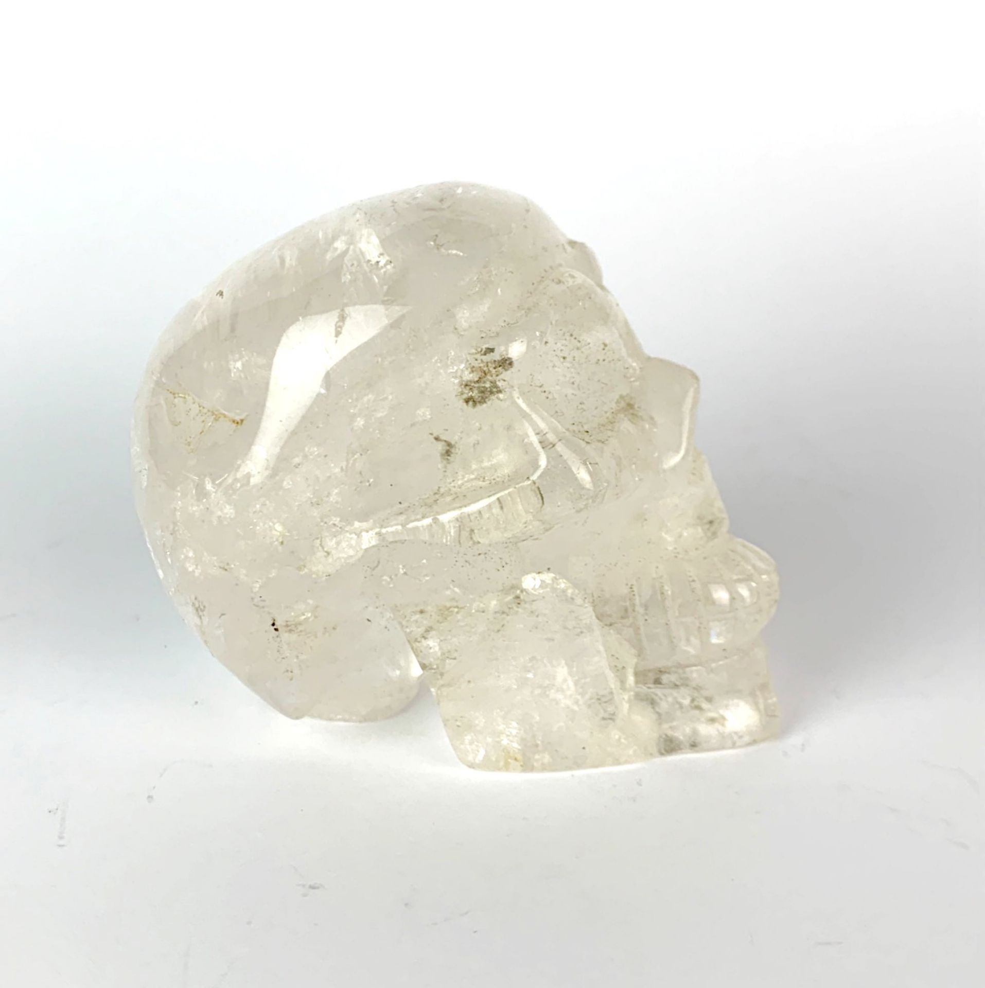 A carved rock crystal skull, H. 7cm. - Image 3 of 5