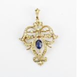 An antique 9ct yellow gold brooch/pendant set with an oval cut sapphire and seed pearls, L. 5cm.