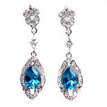 A pair of 925 silver drop earrings set with marquise cut blue topaz and white stones, L. 3.6cm.