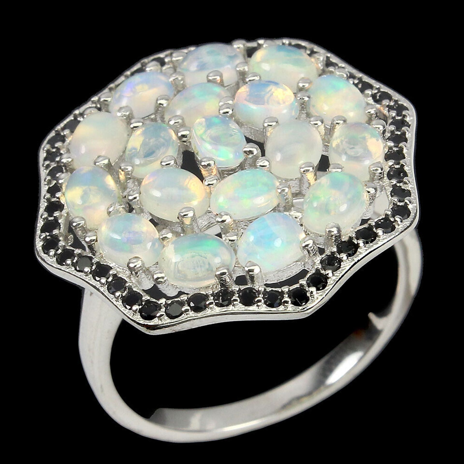 A 925 silver ring set with cabochon cut opals and black spinels, Dia. 2.3cm. - Image 2 of 2