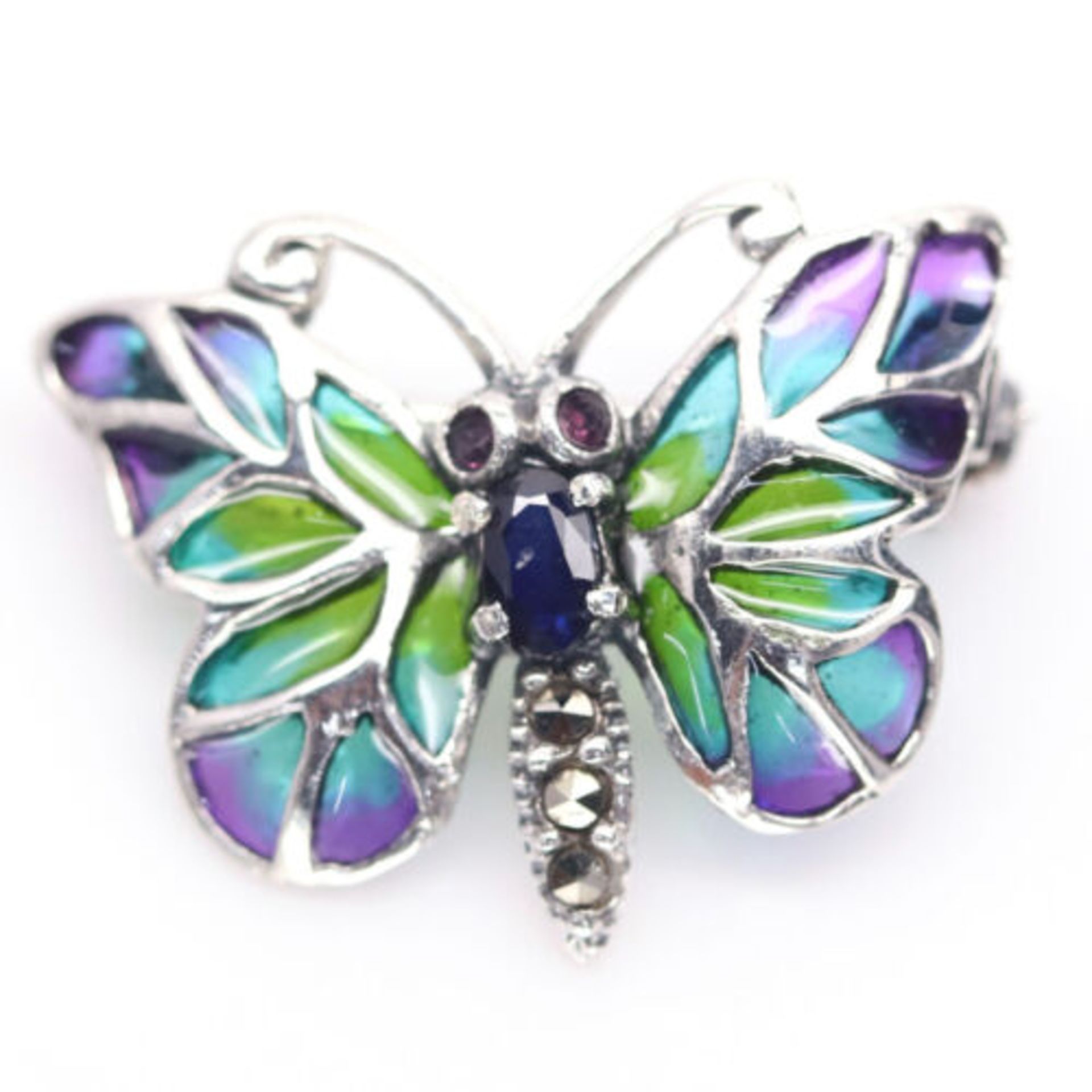 A 925 silver butterfly shaped enamelled brooch / pendant set with oval cut sapphire and marcasite,