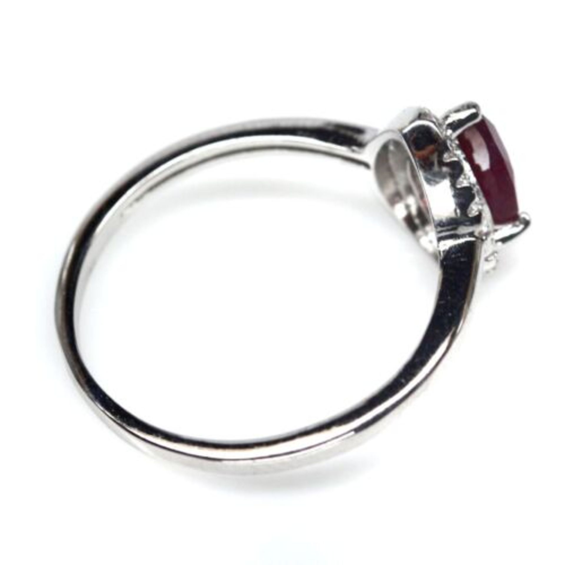 A 925 silver ring set with a pear cut ruby and white stones, (N). - Image 3 of 3