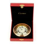 A boxed Trinity de Cartier travel/desk clock in yellow, white and rose gold plating (no. 563323GD).